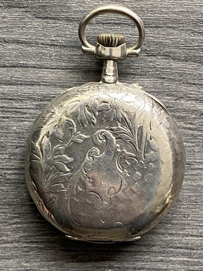 A round steel masonic pocket watch with the...