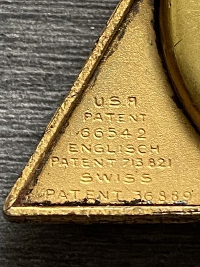 A masonic pocket watch in gilded metal, triangular...