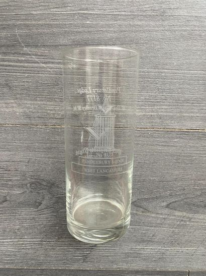 Stemmed glass with engraved symbols of the...