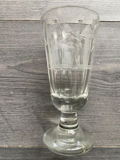 Flared stemmed glass with symbols of the...