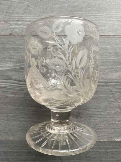 Large stemmed glass richly engraved with...