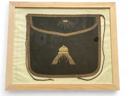 A brown framed Odd Fellows apron with gold...