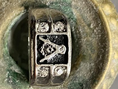 A ring with masonic motif (square & compasses...