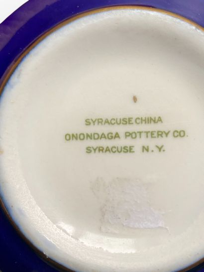A colored earthenware coffee mug with three...