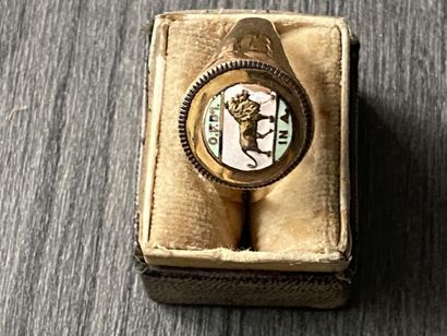 A 10 karat gold ring with enameled scene...