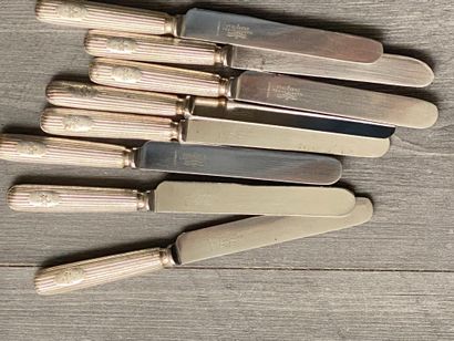 Set of eight silver-plated knives signed...