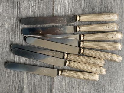 Set of eight silver-plated knives signed...