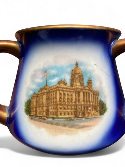 A colored earthenware coffee mug with three...