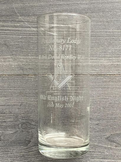 Stemmed glass with engraved symbols of the...