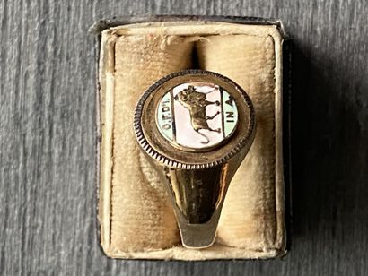 A 10 karat gold ring with enameled scene...