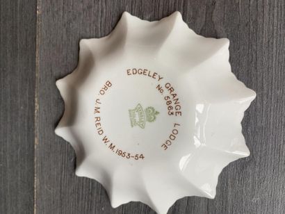 An orphaned saucer with floral decoration...