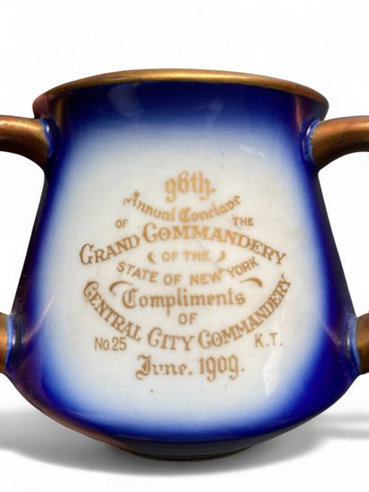 A colored earthenware coffee mug with three...