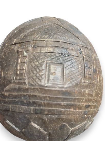 Engraved coconut-shaped flask belonging to...