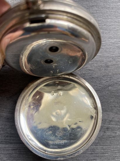 A round steel masonic pocket watch with a...