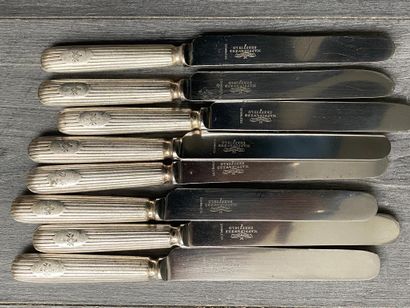 Set of eight silver-plated knives signed...
