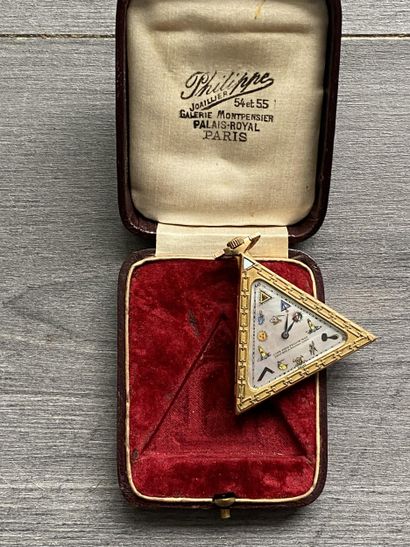 A masonic pocket watch in gilded metal, triangular...