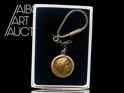 Bronze key ring with Masonic decoration and...
