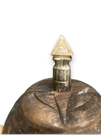 Engraved coconut-shaped flask belonging to...