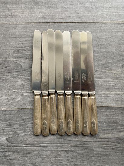 Set of eight silver-plated knives signed...