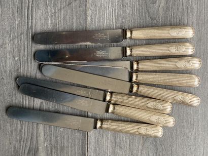 Set of eight silver-plated knives signed...