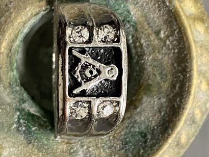 A ring with masonic motif (square & compasses...