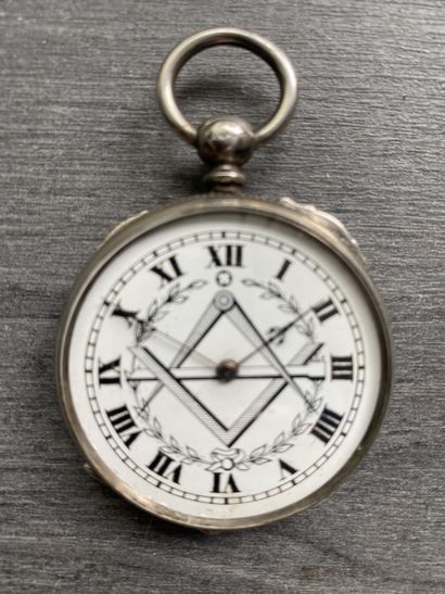 A round steel Masonic pocket watch with black...