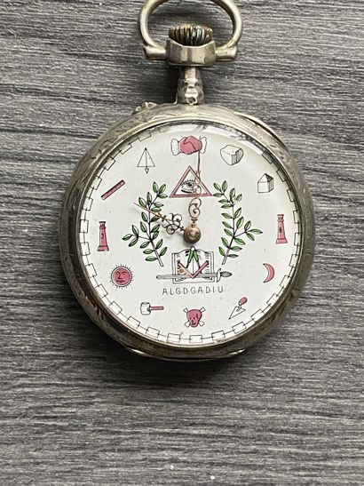 A round steel masonic pocket watch with the...