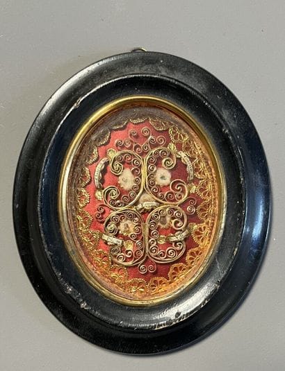 [Paperolle-reliquaire]. Four relics including...