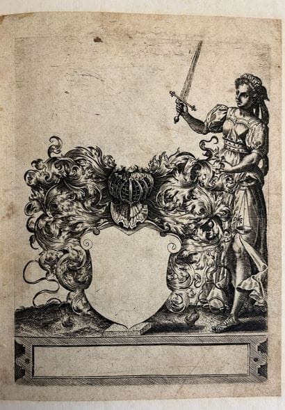 [Engraving; ornament]. ESCUTCHEONS AND CARTELS....