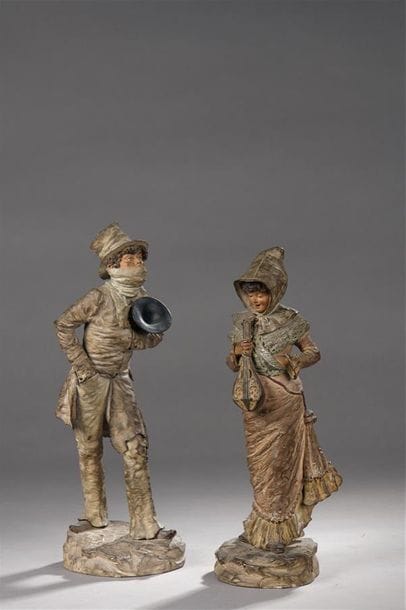 Two polychrome terracotta statuettes representing...
