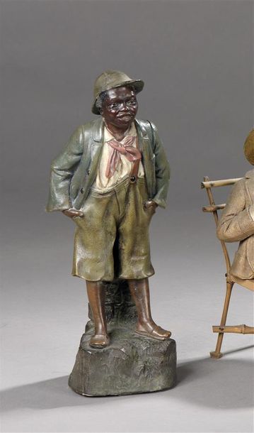 Two polychrome terracotta statuettes adorned...