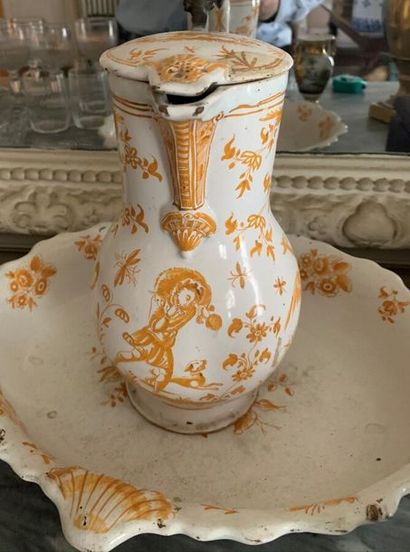 Pitcher and a basin in earthenware from the...