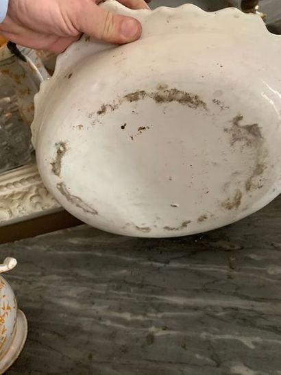 Pitcher and a basin in earthenware from the...