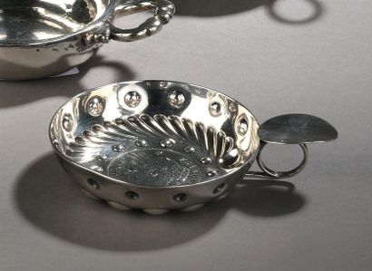 A set of three wine cups: - Silver wine cup...
