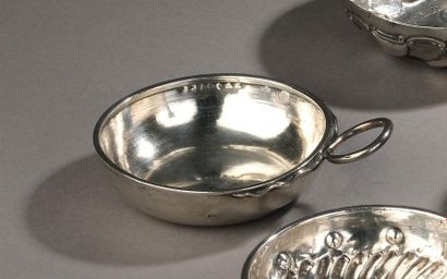 A set of three wine cups: - Silver wine cup...