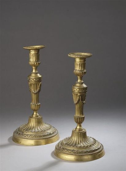 Pair of gilt bronze torches, was baluster...