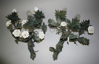 A pair of green painted metal sconces with...