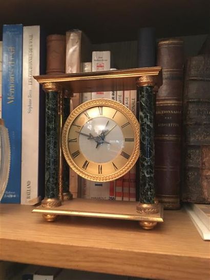 A set of two clocks: - A small gilt bronze...