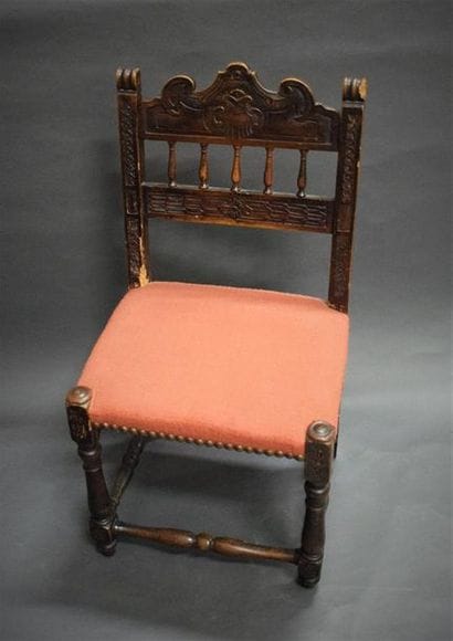 Walnut chair with a backrest with stitches...