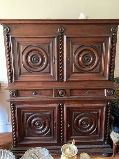 Moulded walnut sideboard with four concentric...