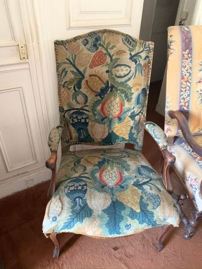 Armchair with high curved back. Curved wooden...