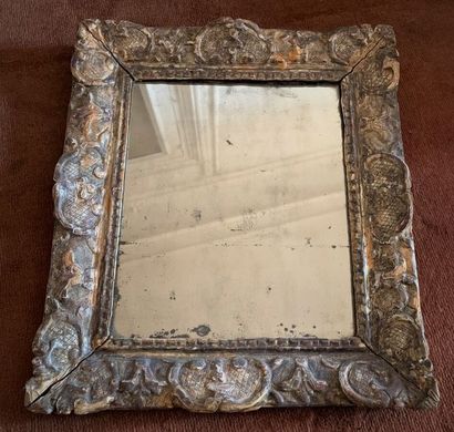 Antique mirror in a gilded wood frame. 18th...