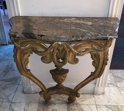 Small gilded and carved wooden console decorated...