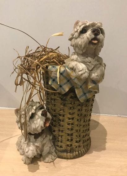 Resin cache pot decorated with a basket and...
