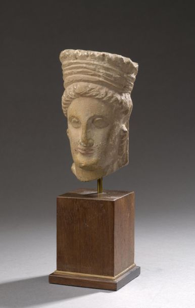 Female head with bulging almond eyes, she...