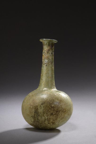 Balsamary with globular rumen and high neck.
Restoration...