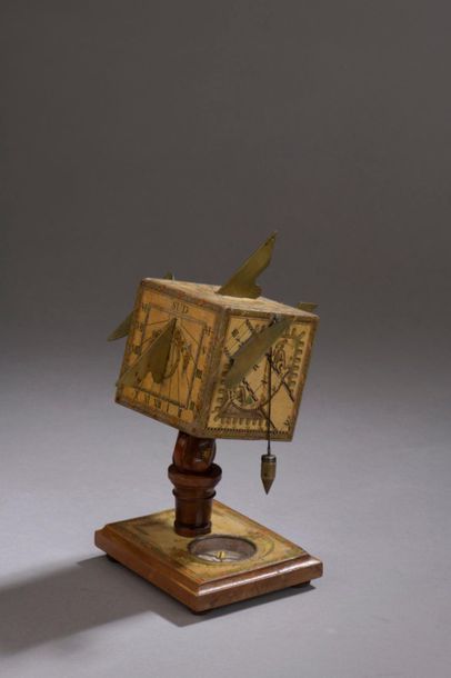 Polyhedral sundial with five faces covered...
