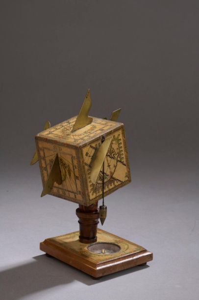 Polyhedral sundial with five faces covered...