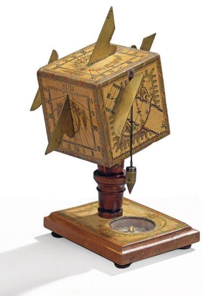 Polyhedral sundial with five faces covered...