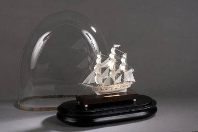 Ivory model. Rigged and veiled light frigate.
The...
